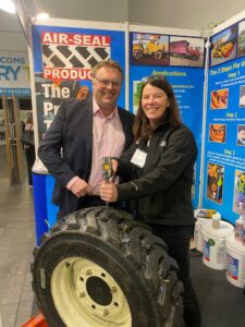 Terry Jones from the NFU visits Air-Seal premier tyre sealant stand at Dairy Tech 2023